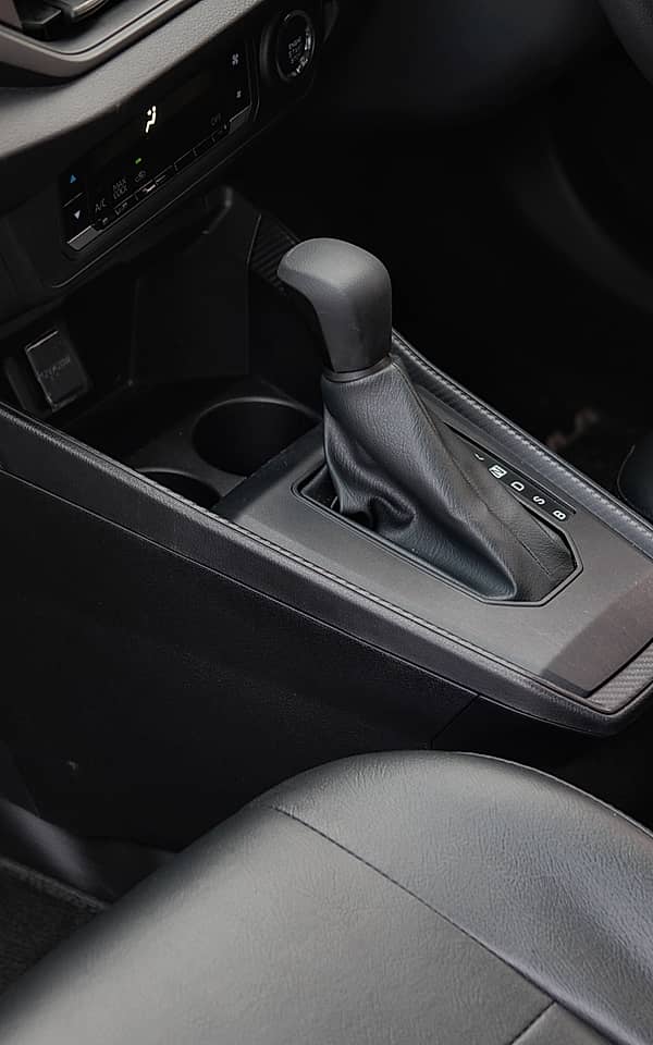 Close-up of the automatic gear shifter and center console.
