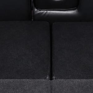 Empty car trunk with folded down rear seats.